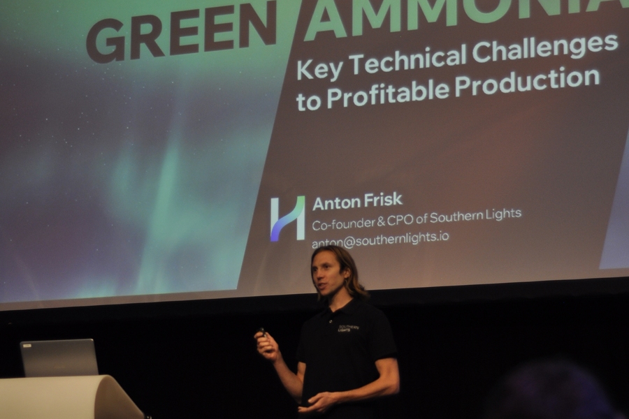 Anton Frisk on stage presenting